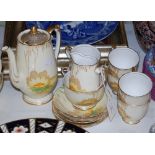 A ROSLYN CHINA LILLY PATTERN PART COFFEE SET