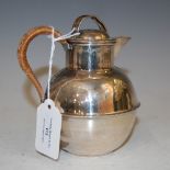 A BIRMINGHAM SILVER JERSEY CREAM JUG AND COVER WITH WICKER HANDLE, GROSS WEIGHT 5.1 TROY OZ