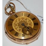 A 9CT GOLD OPEN FACED POCKET WATCH WITH ROMAN NUMERAL DIAL AND SUBSIDIARY SECONDS DIAL BEARING