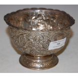 A LONDON SILVER FOOTED BOWL WITH EMBOSSED FOLIATE AND C-SCROLL DECORATION, 4.8 TROY OZ