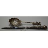 A 19TH CENTURY DUTCH SILVER SPOON WITH WINDMILL FINIAL, TOGETHER WITH A SILVER HANDLED LETTER