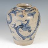 A Chinese blue and white crackle glazed jar, decorated with two dragons, the shoulder with two