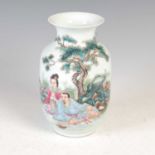 A Chinese porcelain famille rose vase, early 20th century, painted with a pair of figures in a