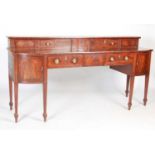 A 19th century Scottish mahogany sideboard, the stage back fitted with two sliding cupboard doors