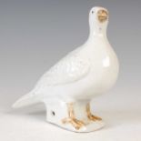 A Chinese porcelain model of a dove, with black painted eye detail, 17cm high