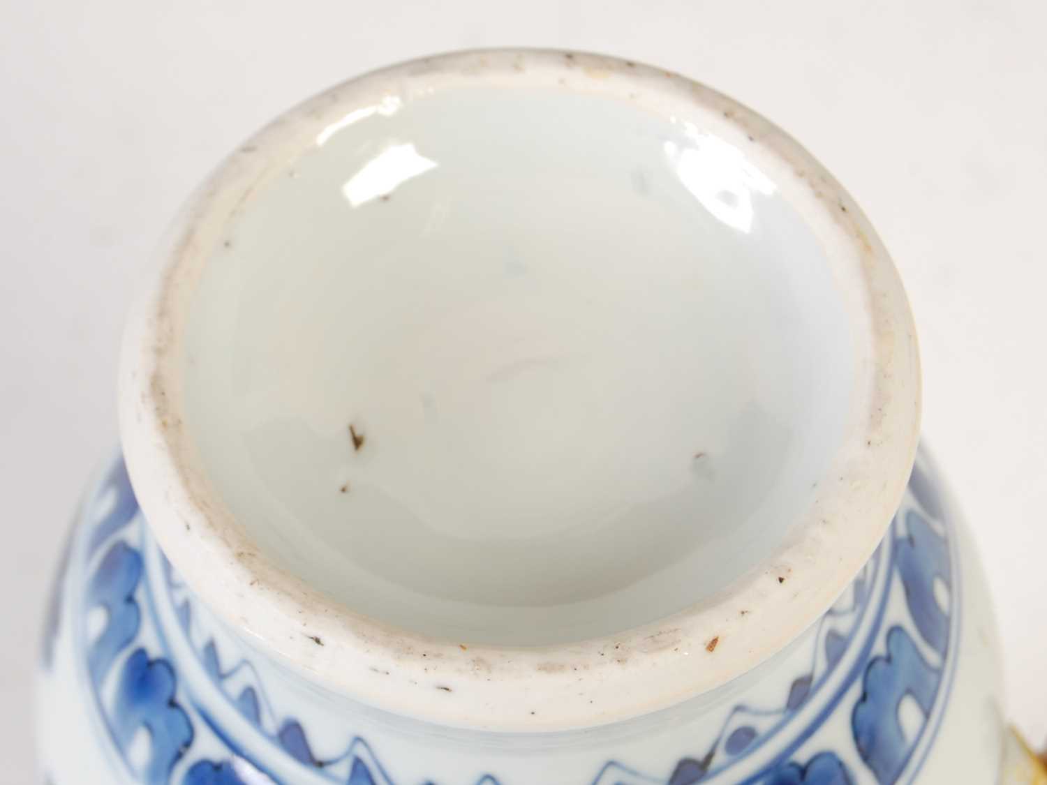 A Chinese porcelain blue and white jug, Qing Dynasty, decorated with three figures in a fenced - Image 10 of 10