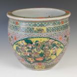 A Chinese porcelain pink ground fish bowl/ jardiniere, Qing Dynasty, the interior decorated with six