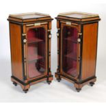 A pair of 19th century Neoclassical style walnut, amboyna and ebonised gilt metal mounted display