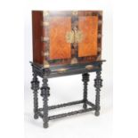 A late 19th century rosewood and ebonised gilt metal mounted Colonial style cabinet on integral