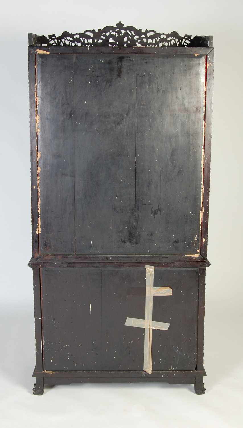 A Chinese dark wood display cabinet/ bookcase, late 19th/ early 20th century, the upper section with - Image 8 of 8