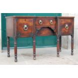 A 19th century mahogany and ebony lined inverted breakfront sideboard, the shaped rectangular top