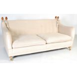 A Country House style drop-end sofa, the rectangular seat with two loose cushions with each arm