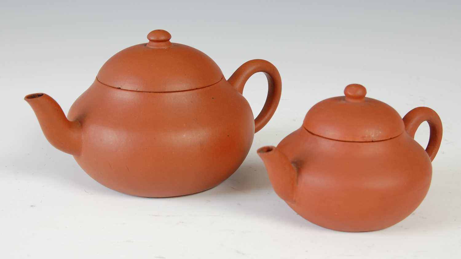 Three Chinese Yixing tea pots and covers, the largest decorated in relief with pine trees and - Image 9 of 14