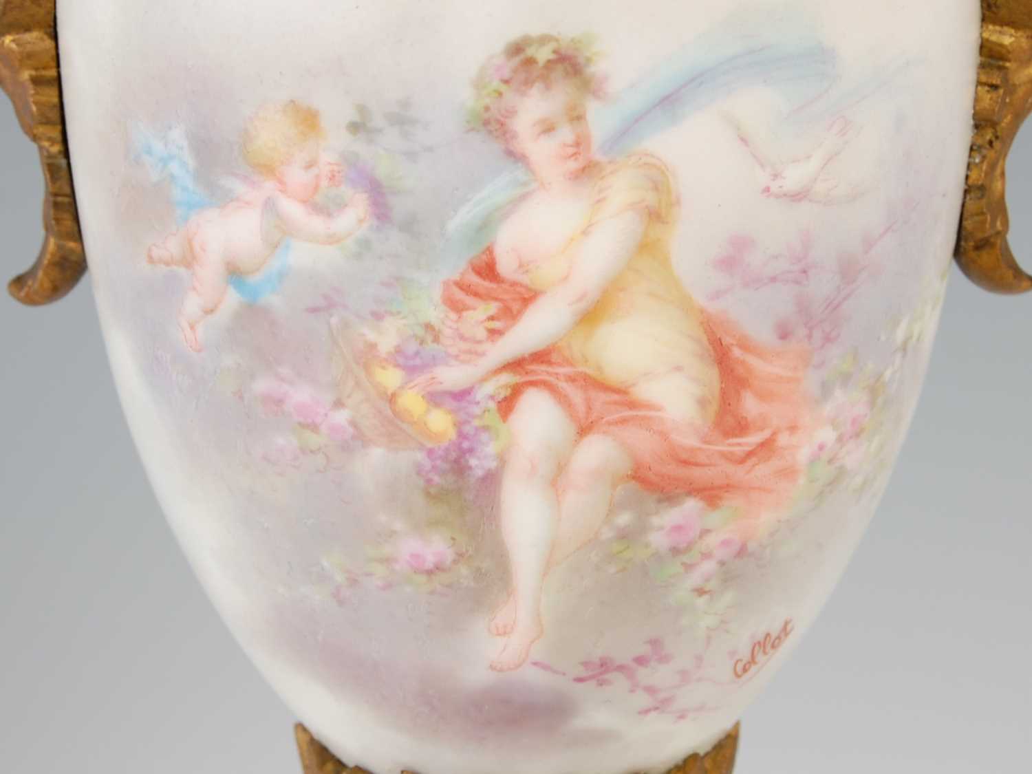 A pair of gilt metal mounted hand-painted porcelain urns, decorated with classical maidens and - Image 7 of 8