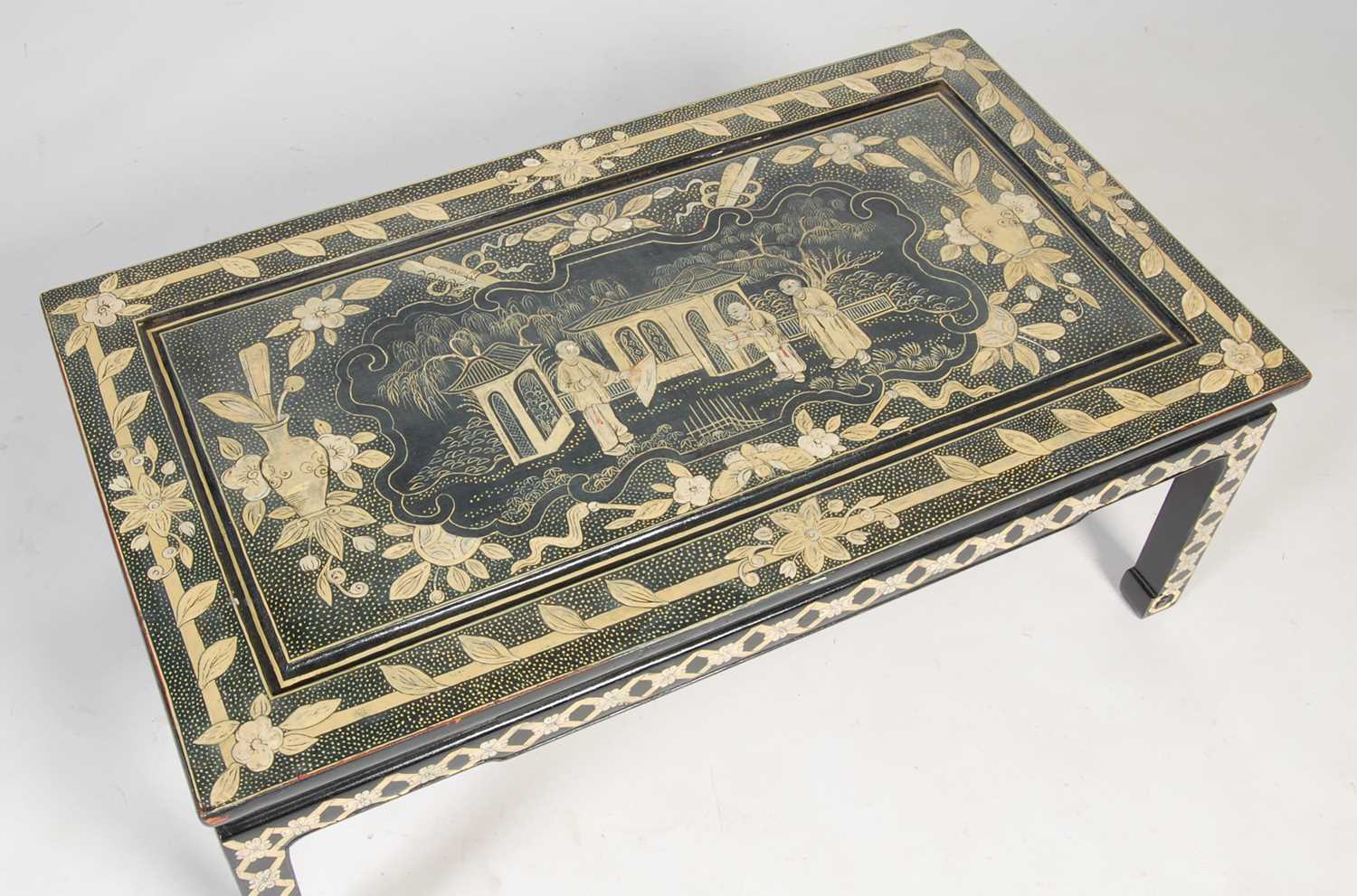 A Chinese black lacquer chinoiserie decorated coffee table, the rectangular top decorated with - Image 2 of 8