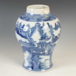 A Chinese porcelain blue and white jar, Qing Dynasty, decorated with pavilions, figures and trees in