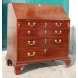 A late 19th / early 20th century mahogany bureau, the hinged fall front opening to a fitted interior