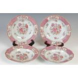 A set of four Chinese porcelain famille rose soup plates, Qing Dynasty, decorated with ribbon-tied
