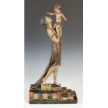 Ugo Cipriani (1887 - 1960), an Art Deco bronzed and silvered spelter figure group of mother and boy,