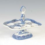 A 19th century blue printed Pearlware egg stand, willow pattern, pierced to hold six eggs, 16.5cm