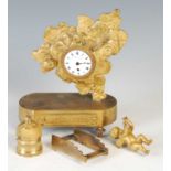 An early 19th century French ormolu miniature clock 'Gare La Bombe', the black and white circular