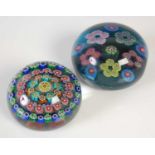 Two Paul Ysart paperweights, comprising a millefiori weight on a clear ground, rough pontil, 8cm