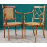 An Edwardian painted satinwood armchair, the rectangular back with canework panel above an oval