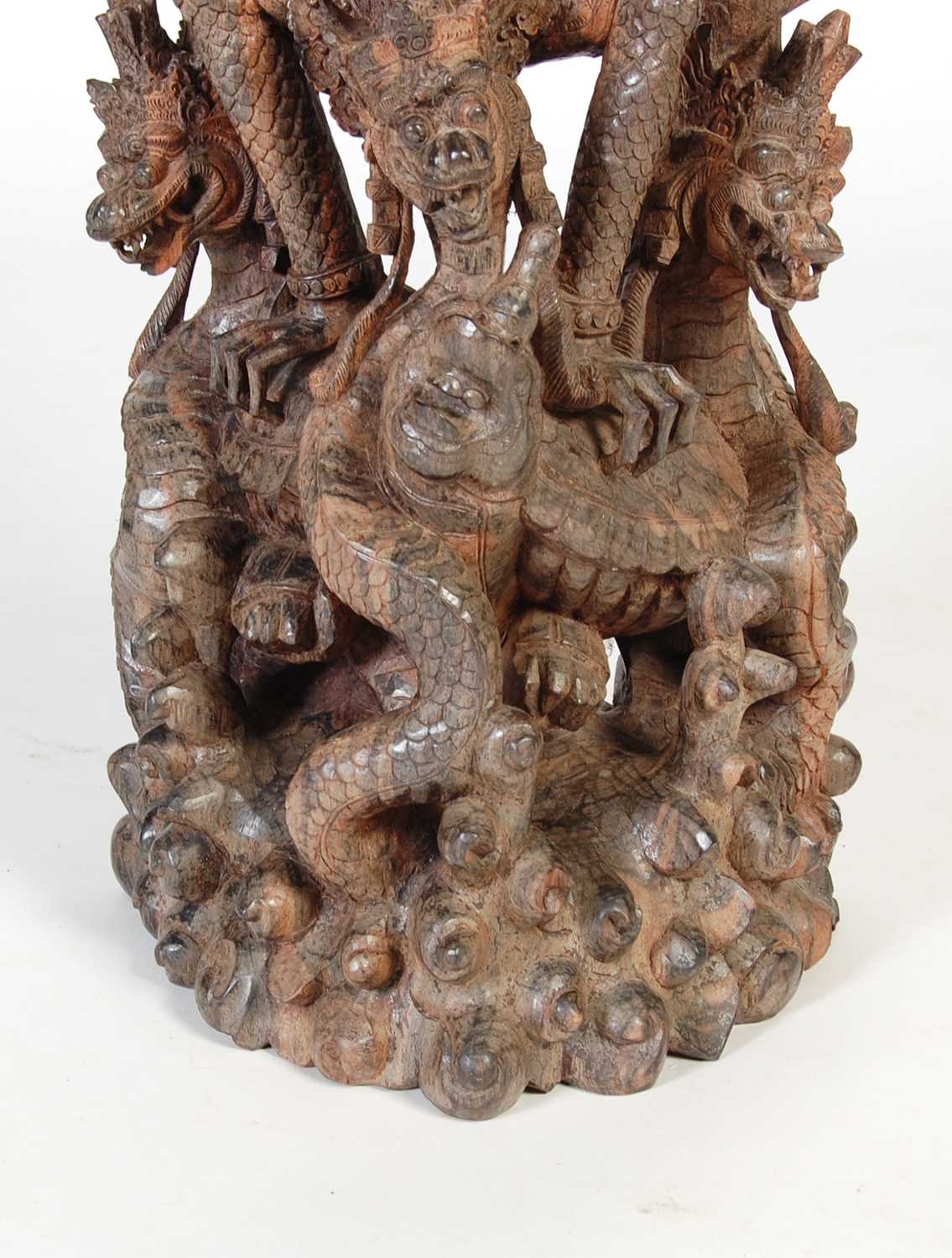 An Indonesian carved hardwood figure of Garuda and dragons, 97.5cm high. - Image 2 of 6