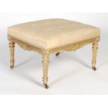 A late 19th/ early 20th century giltwood rectangular stool, the rectangular button-down