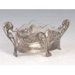 W.M.F., an Art Nouveau white metal and clear glass twin handled table centrepiece, stamped marks and