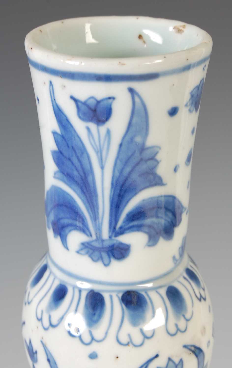 A Chinese porcelain blue and white bottle vase, Qing Dynasty, decorated with scholars and other - Image 4 of 8