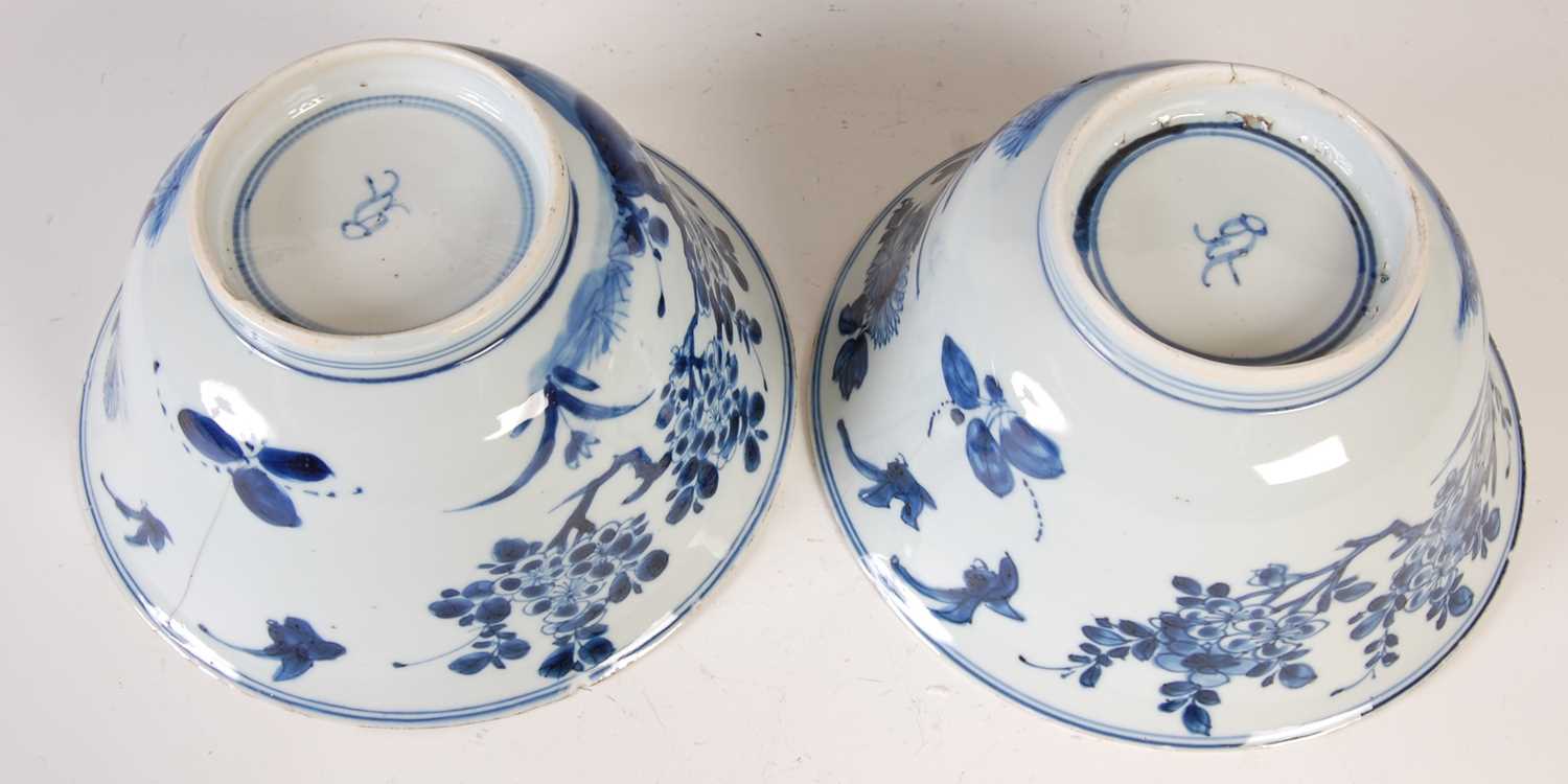 A pair of Chinese porcelain blue and white bowls, Qing Dynasty, the exteriors decorated with - Image 14 of 16