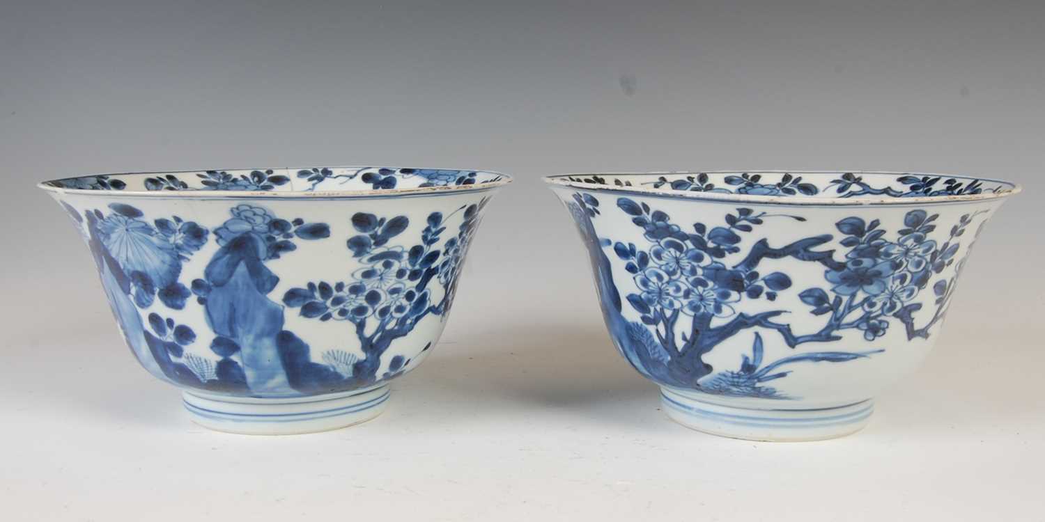 A pair of Chinese porcelain blue and white bowls, Qing Dynasty, the exteriors decorated with - Image 5 of 16