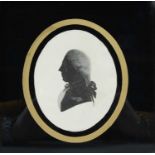A decorative printed portrait miniature silhouette, depicting bust of an 18th century gentleman in