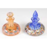 Two Ysart glass inkwells and stoppers, comprising a Paul Ysart inkwell with mottled blue and white