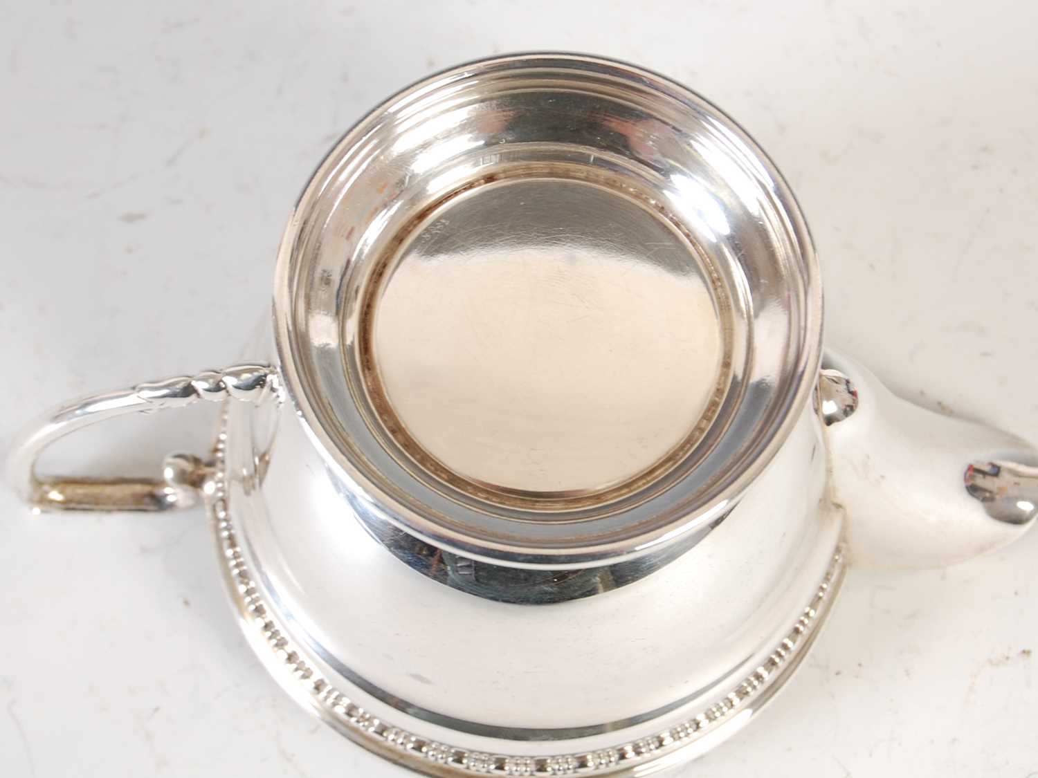 A George V three-piece silver tea set, Birmingham, 1933, makers mark of 'R&D', gross weight 19.6 - Image 15 of 15
