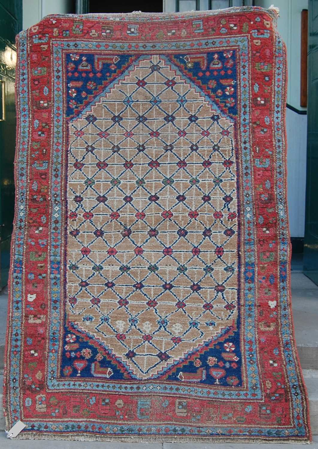 A Persian rug, late 19th/ early 20th century, the rectangular field centred with a lozenge shaped - Bild 2 aus 7