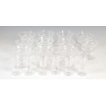 A part suite of 20th century thistle pattern glassware, comprising eleven champagne saucers,