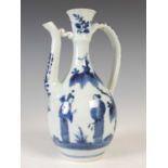 A Chinese porcelain blue and white wine ewer, Qing Dynasty, decorated with a pair of figures in a