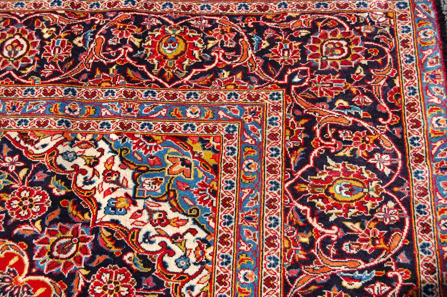 A Persian Kashan carpet, the rectangular field centred with a blue ground oval medallion within a - Bild 5 aus 10