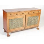 A 19th century mahogany Regency style side cabinet, the rectangular top above three frieze