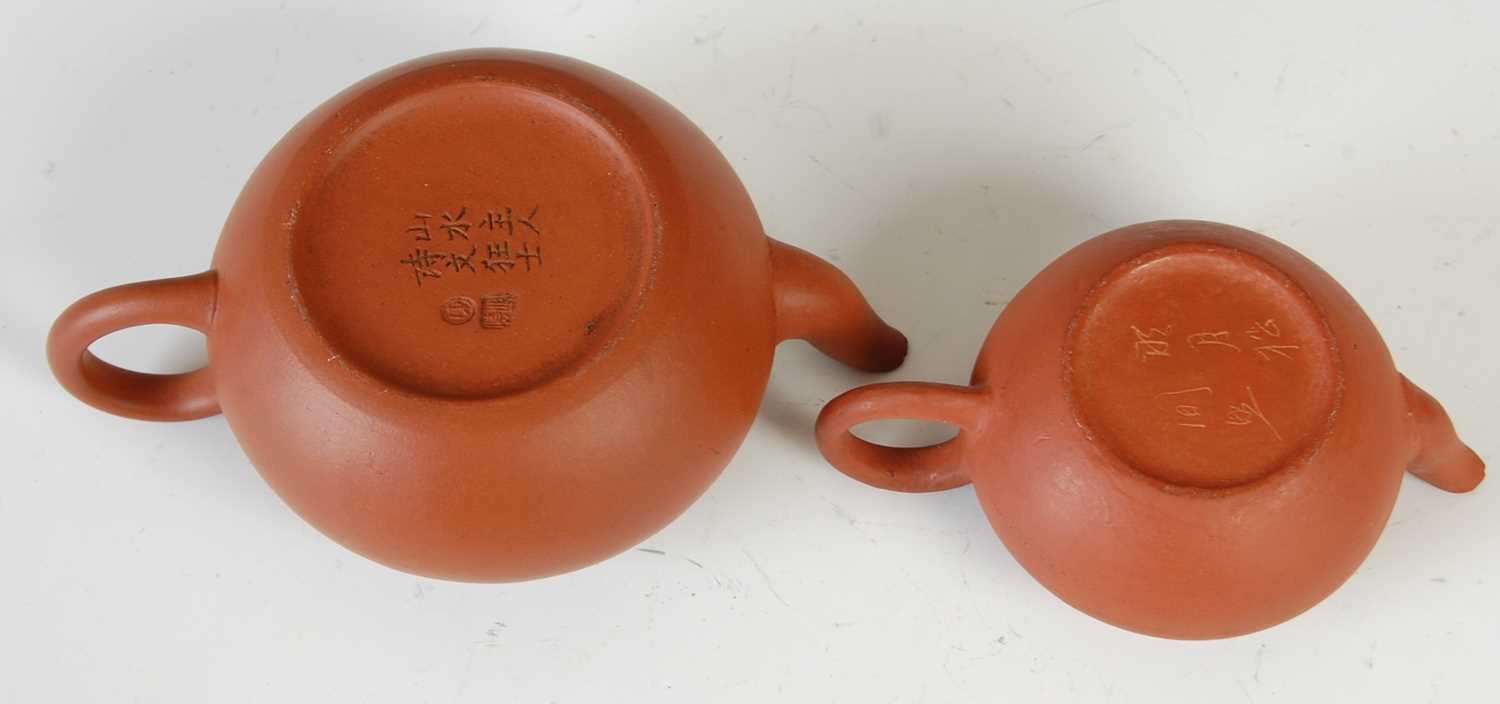 Three Chinese Yixing tea pots and covers, the largest decorated in relief with pine trees and - Image 12 of 14