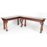 A pair of George III style mahogany console tables, the rectangular tops above a plain frieze with