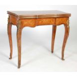 A 19th century kingwood, marquetry and gilt metal mounted card table, the hinged rectangular top