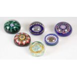 A collection of six Ysart paperweights, including a Paul Ysart garland sulfide weight with Perth