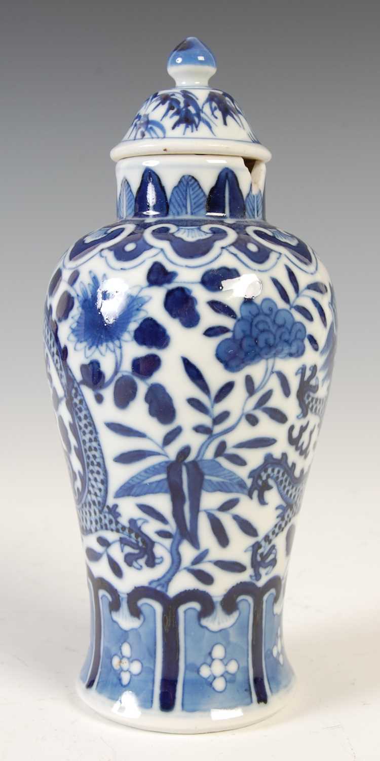 A Chinese porcelain blue and white jar and matched cover, Qing Dynasty, decorated with a pair of - Image 4 of 10