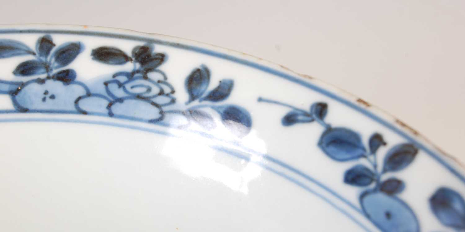 A pair of Chinese porcelain blue and white bowls, Qing Dynasty, the exteriors decorated with - Image 12 of 16