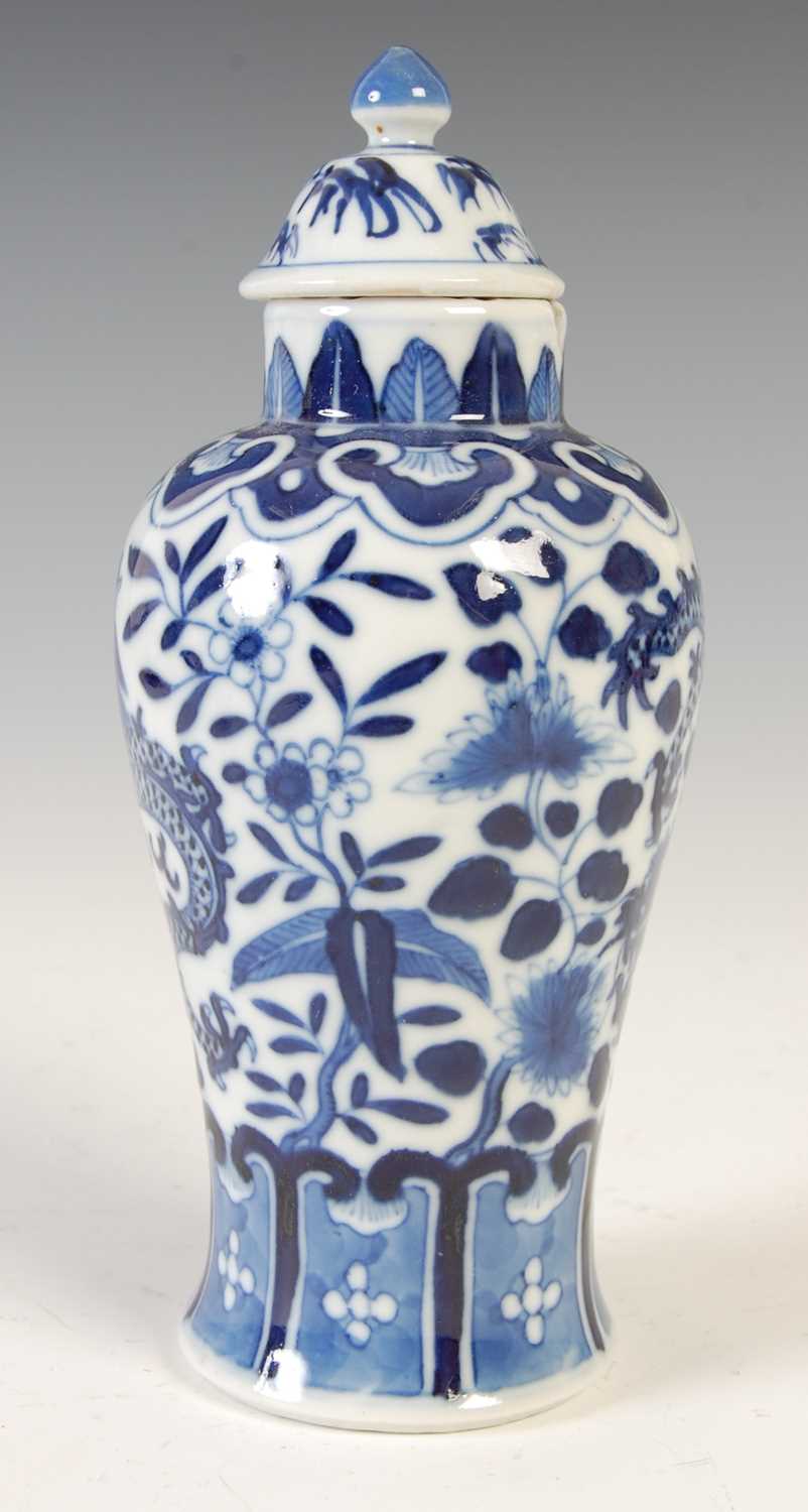 A Chinese porcelain blue and white jar and matched cover, Qing Dynasty, decorated with a pair of - Image 2 of 10
