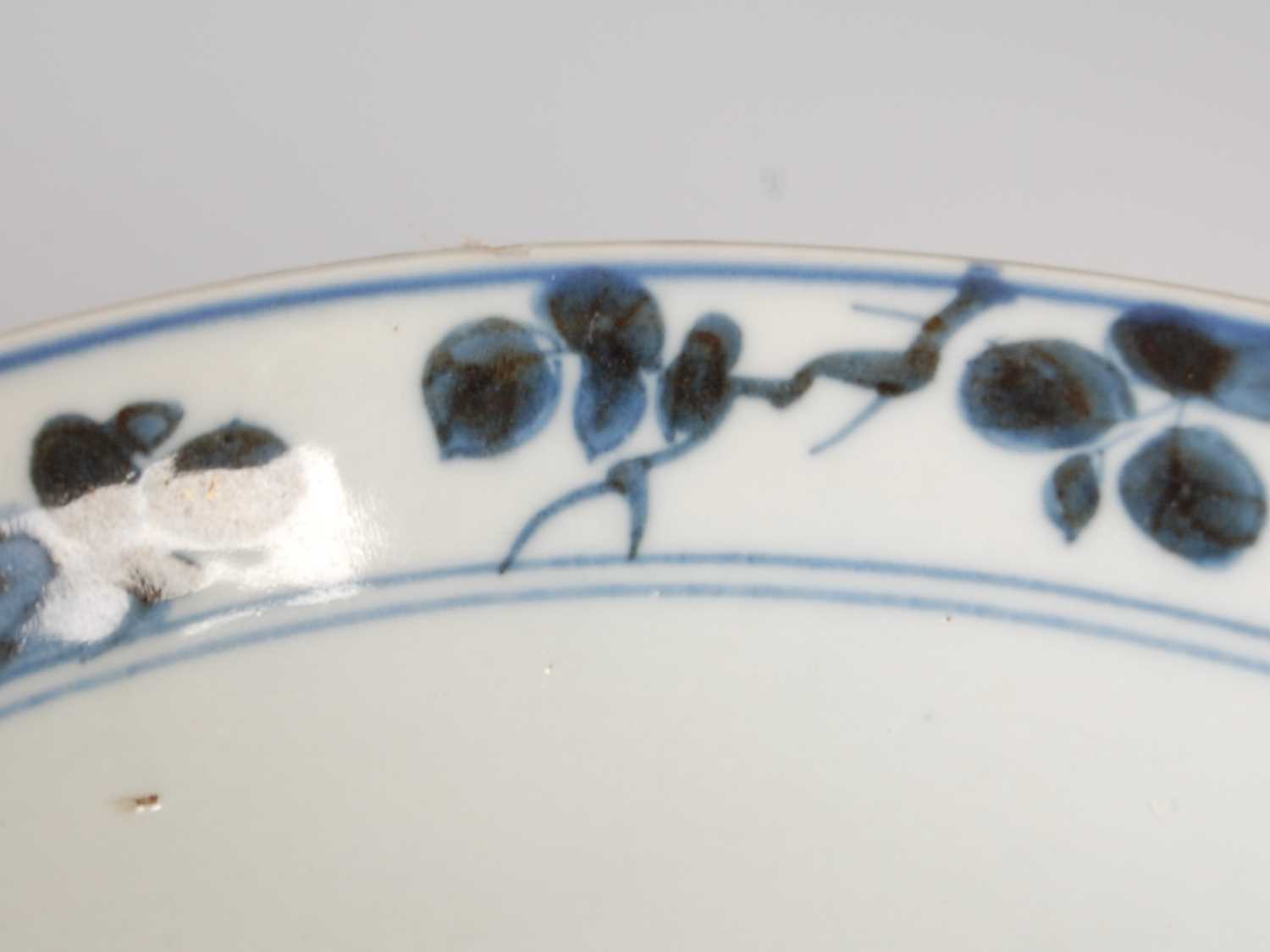 A Chinese porcelain blue and white bowl, Qing Dynasty, the exterior decorated with chrysanthemum, - Image 7 of 11