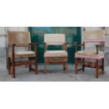 Three various walnut upholstered armchairs, each with upholstered backs and seats with studded